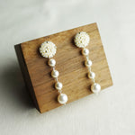 Thea Star Dust Earrings in Ivory Display