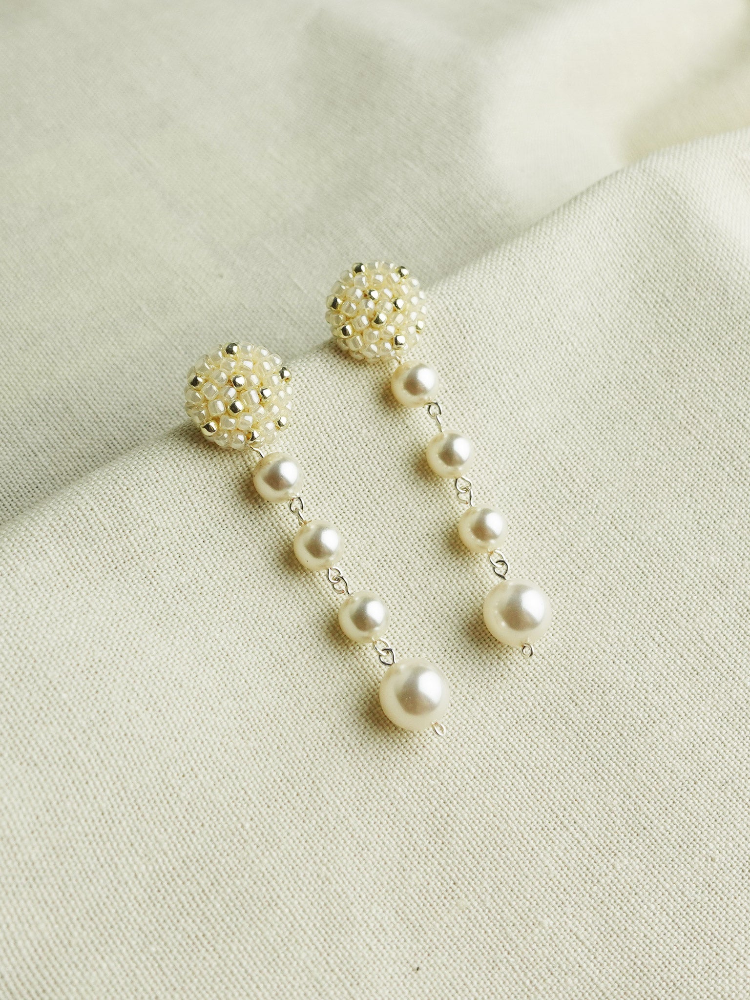 Thea Star Dust Earrings in Ivory Left