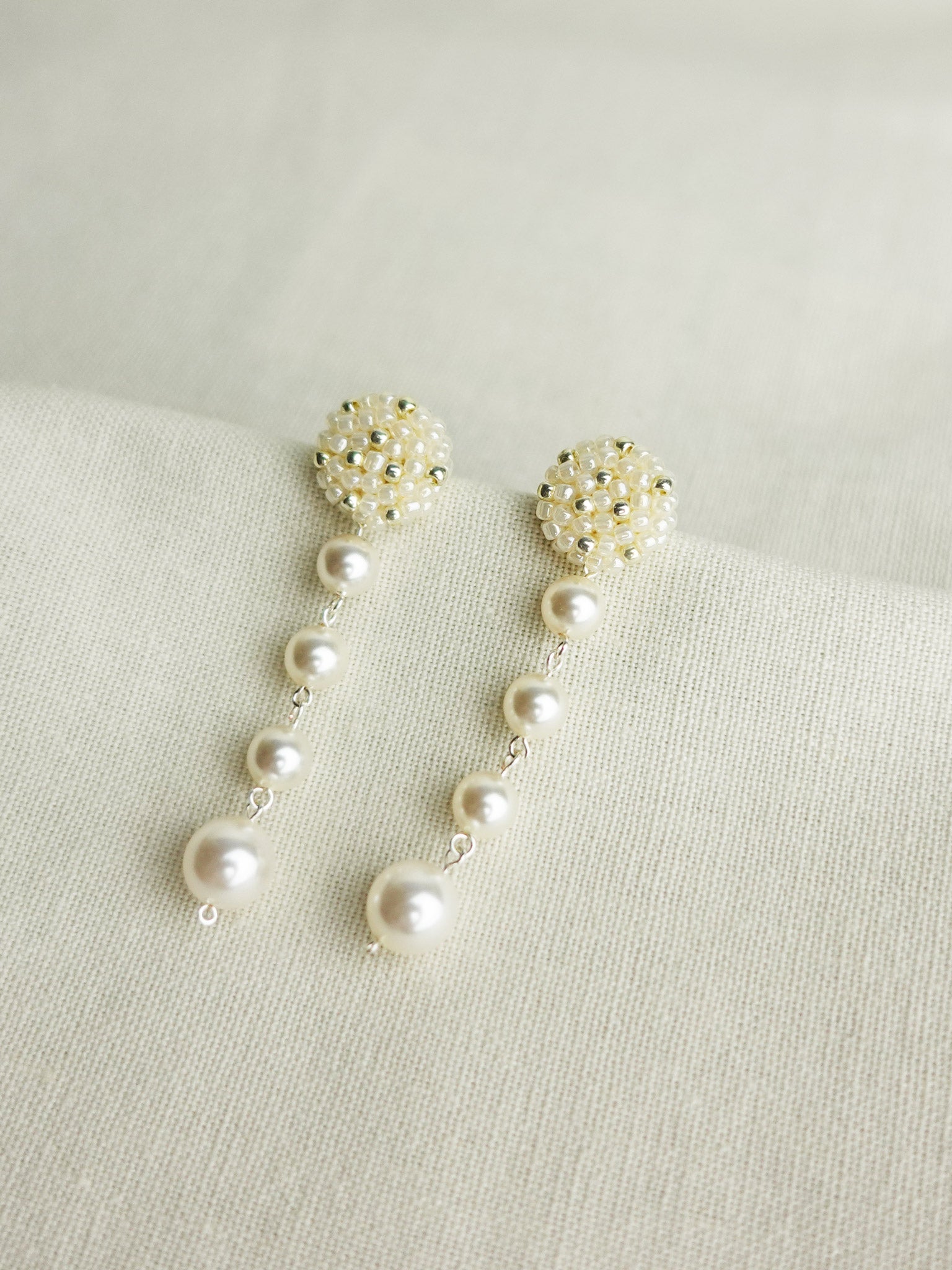 Thea Star Dust Earrings in Ivory Right