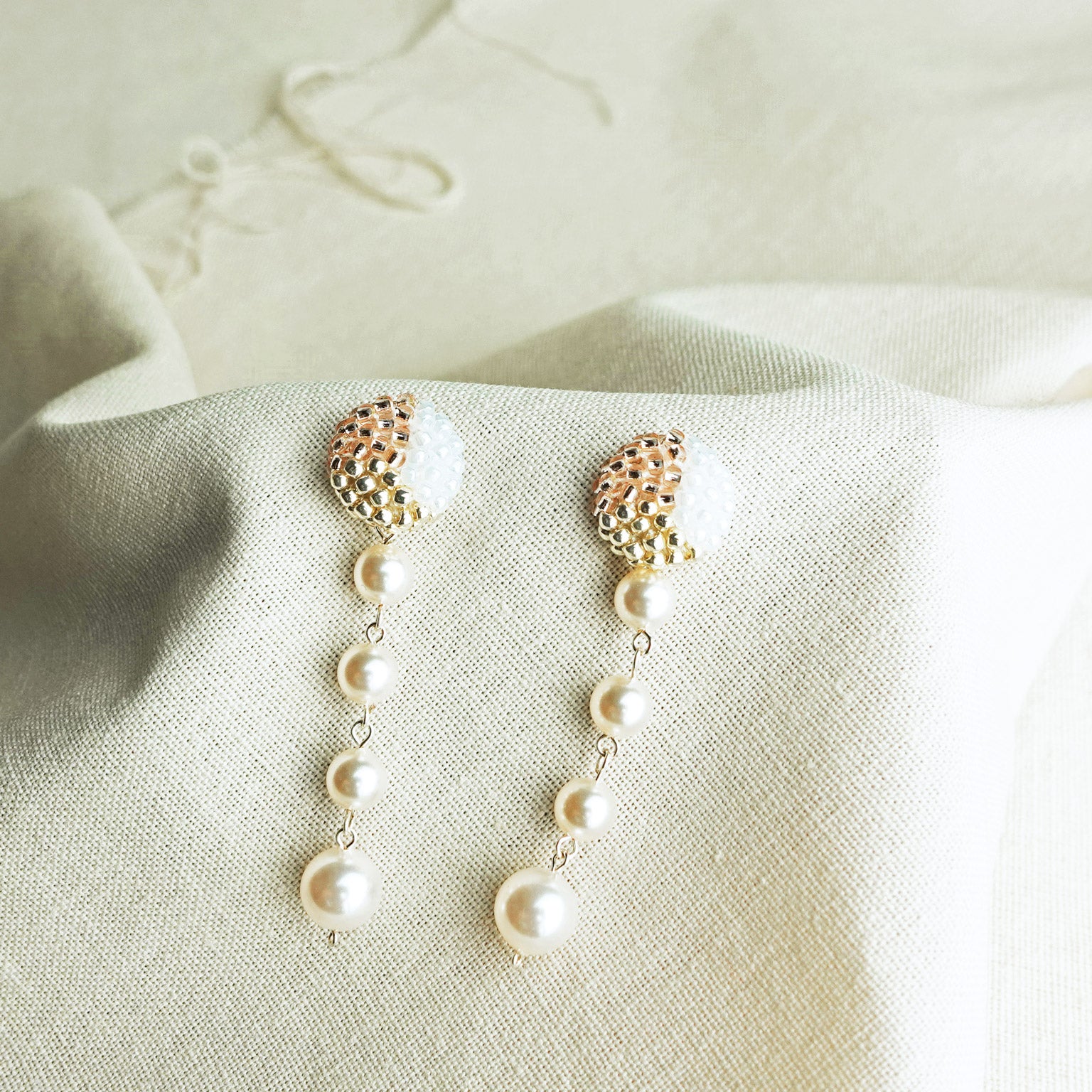 Thea Trio Earrings in Champagne Pink Front