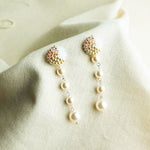 Thea Trio Earrings in Champagne Pink Left
