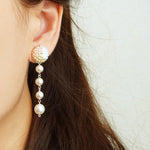 Thea Trio Earrings in Champagne Pink Model