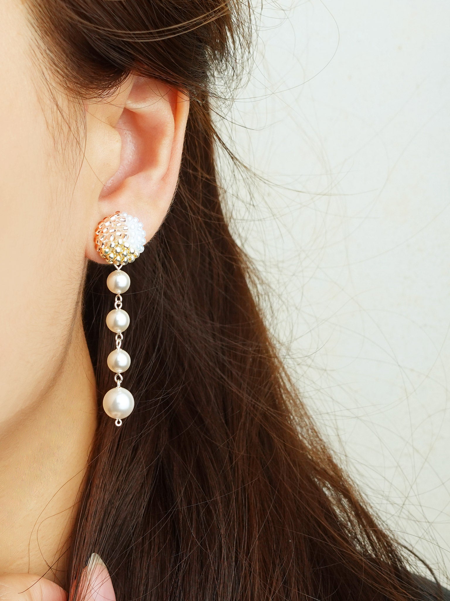 Thea Trio Earrings in Champagne Pink Model