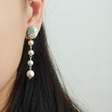 Thea Trio Earrings in Ocean Green Model
