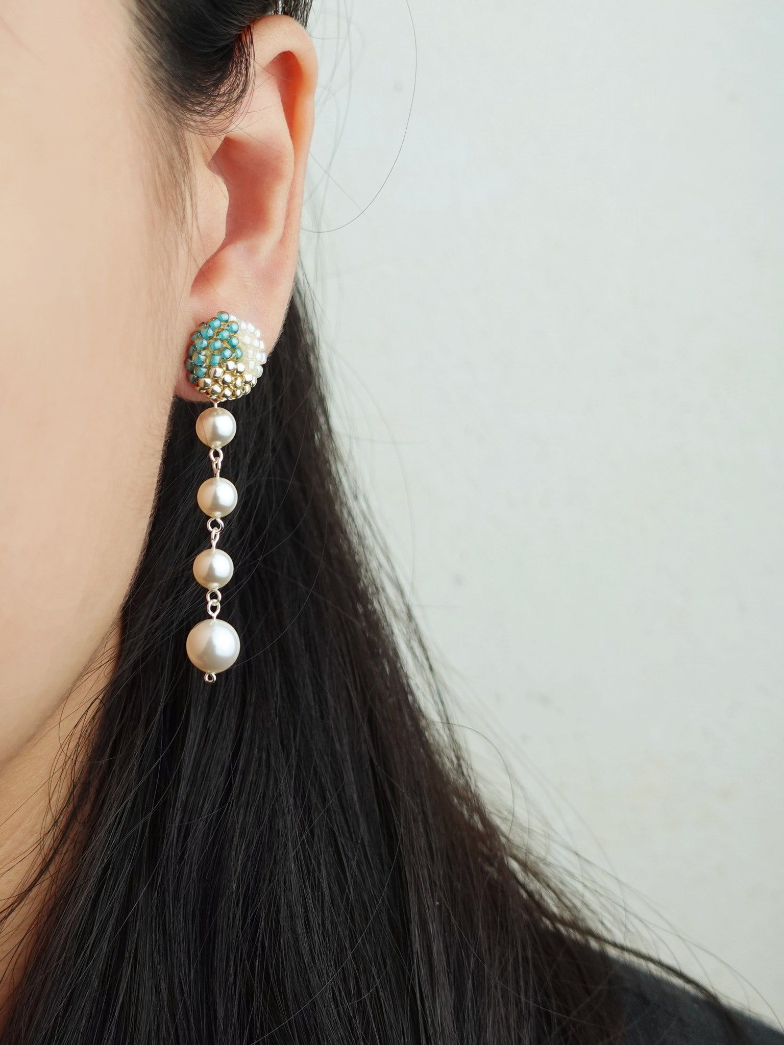 Thea Trio Earrings in Ocean Green Model