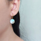 Trio Pendant Earrings in Blue Model