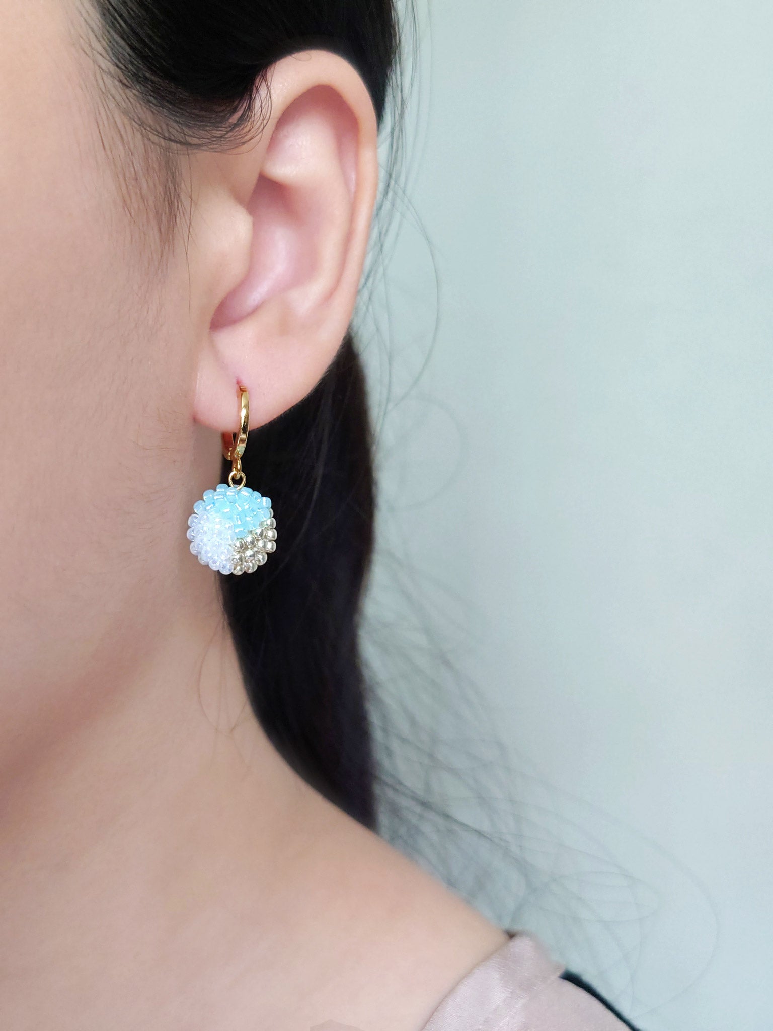 Trio Pendant Earrings in Blue Model
