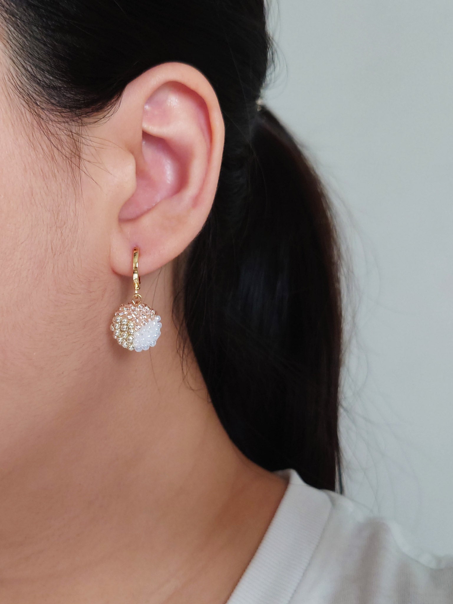 Trio Pendant Earrings in Champagne Pink Model
