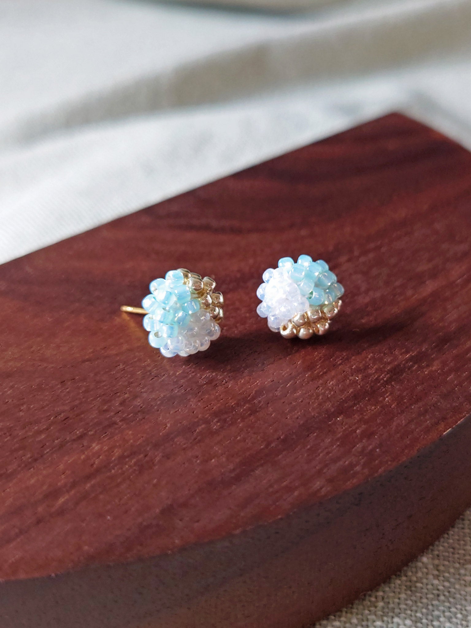 Trio Stud Earrings in Blue Left