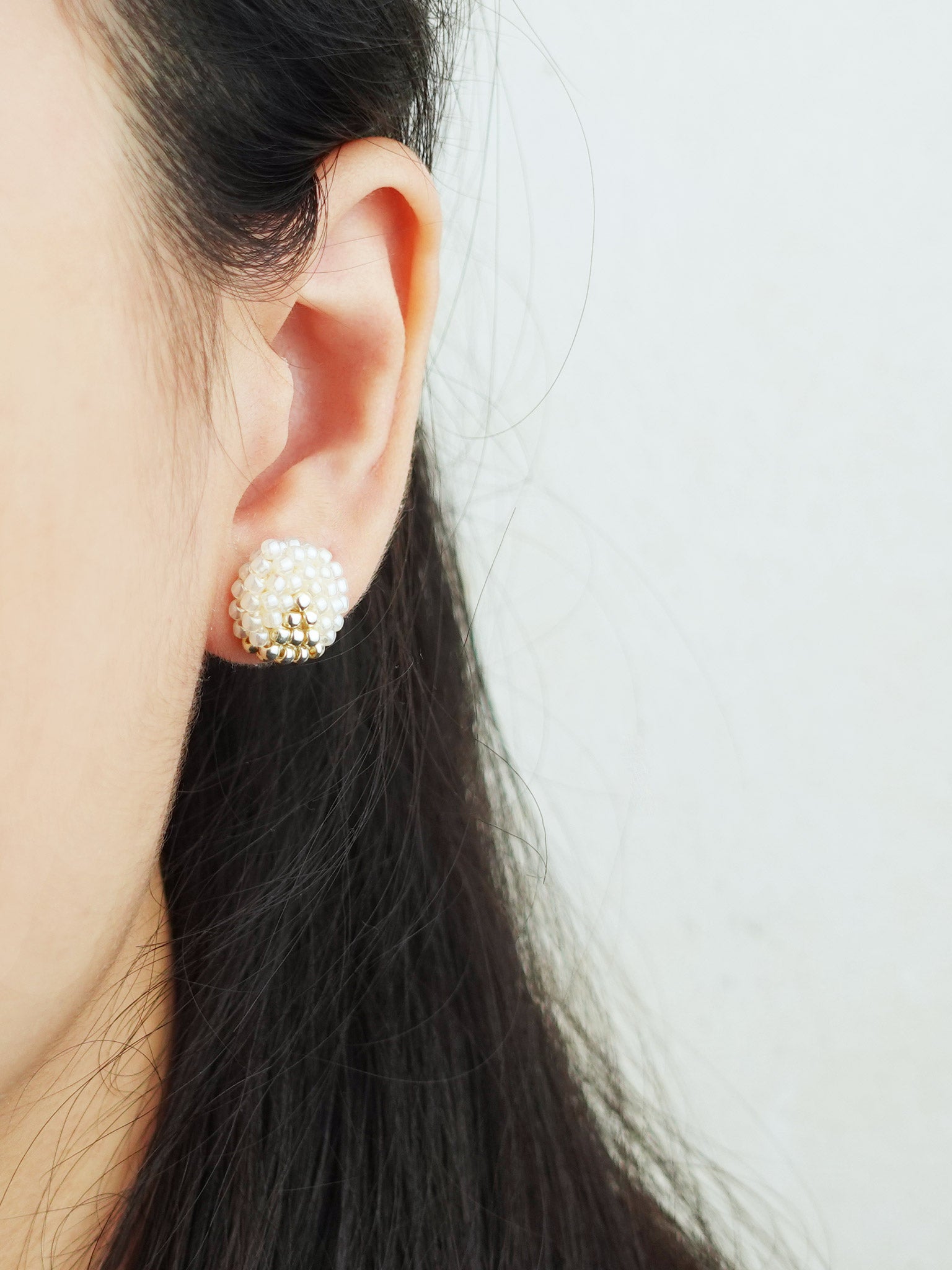 Two Ninths Stud Earrings in Ivory Model