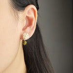 Zia Drop Earrings in Green Model