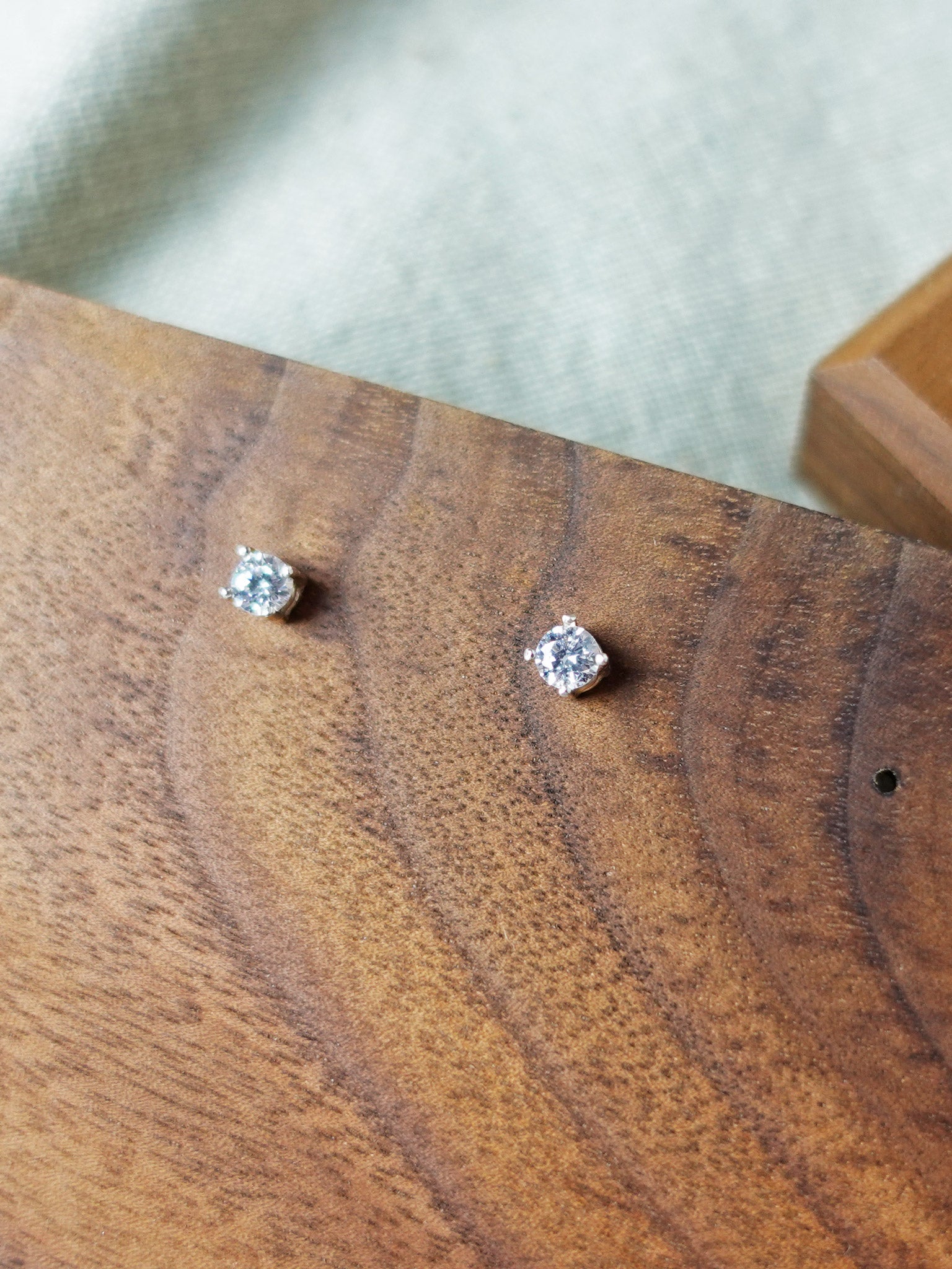 Zircon Stud Earrings in White Display