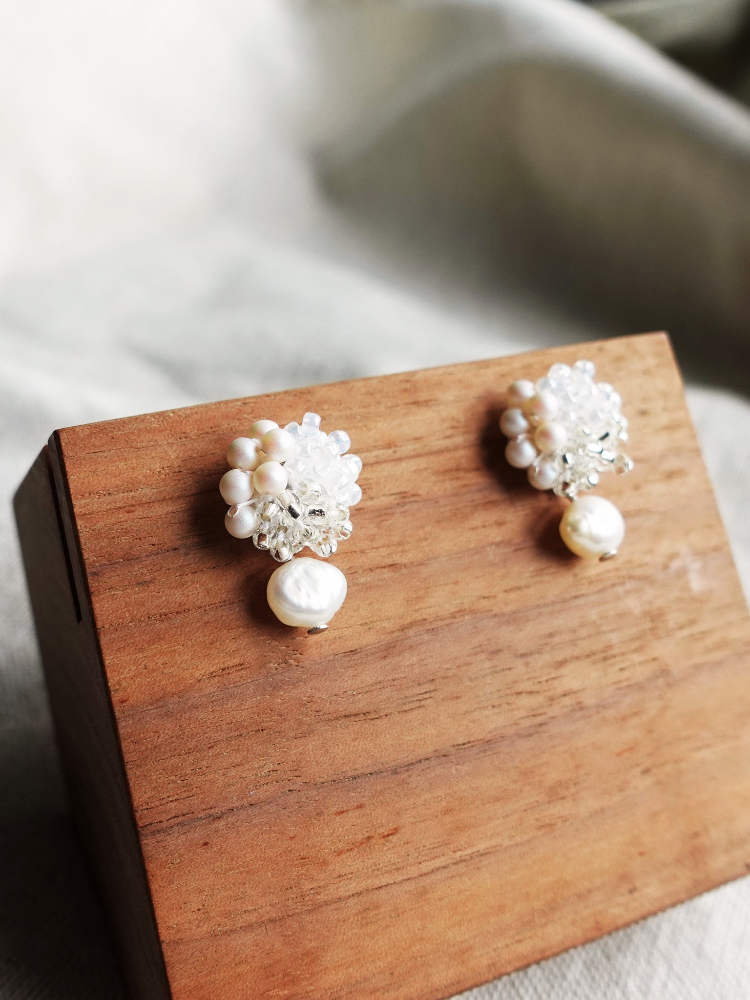 Andelle Lilith Earrings in White Display