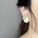 Anemone Stud Earrings in Milk White Model