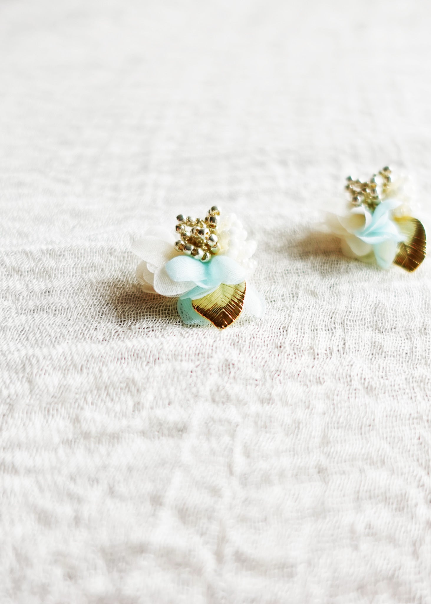 Aurea Bloom Stud Earrings in Light Blue Left Right