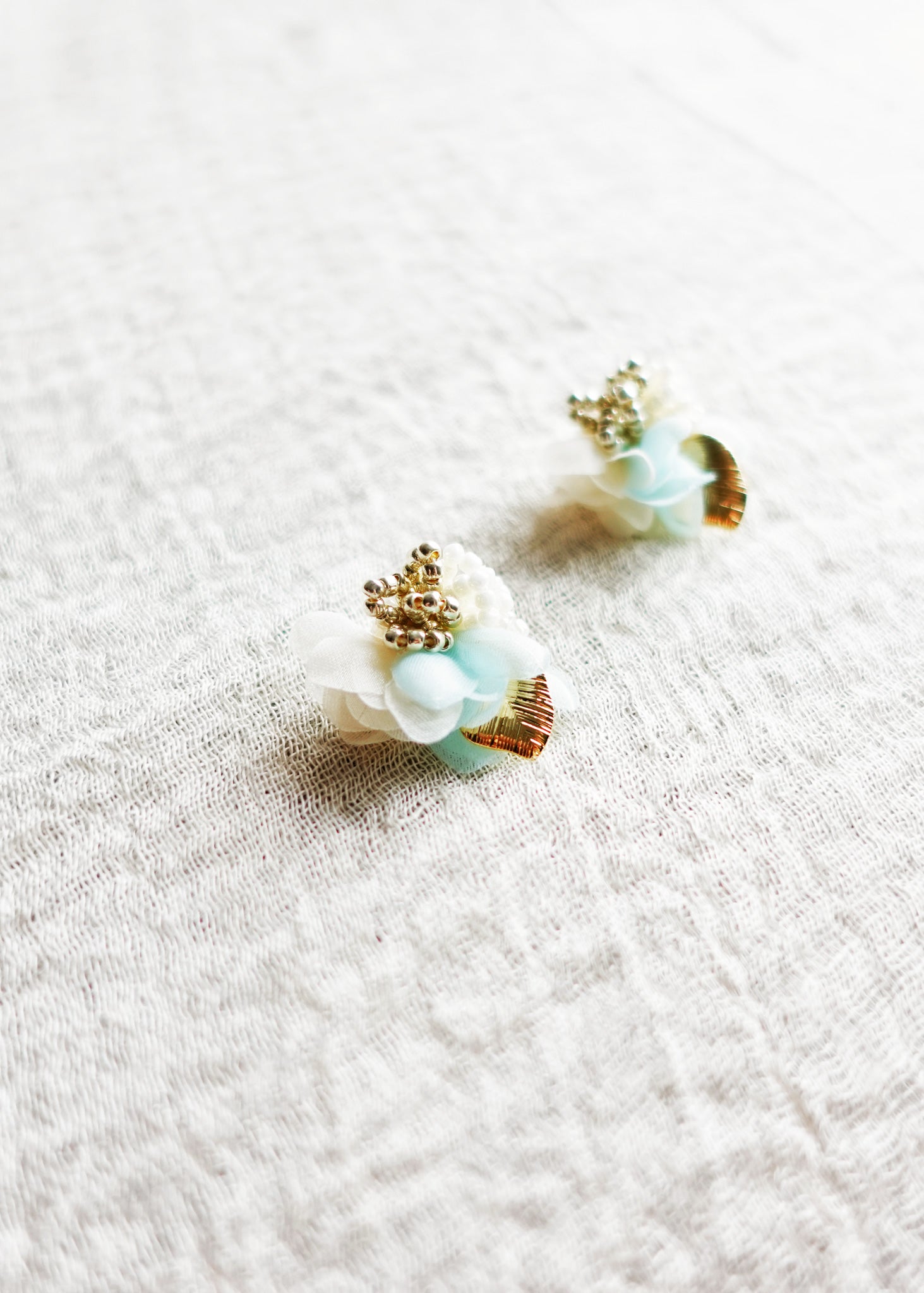 Aurea Bloom Stud Earrings in Light Blue Left Side