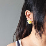 Aurea Bloom Stud Earrings in Yellow Model
