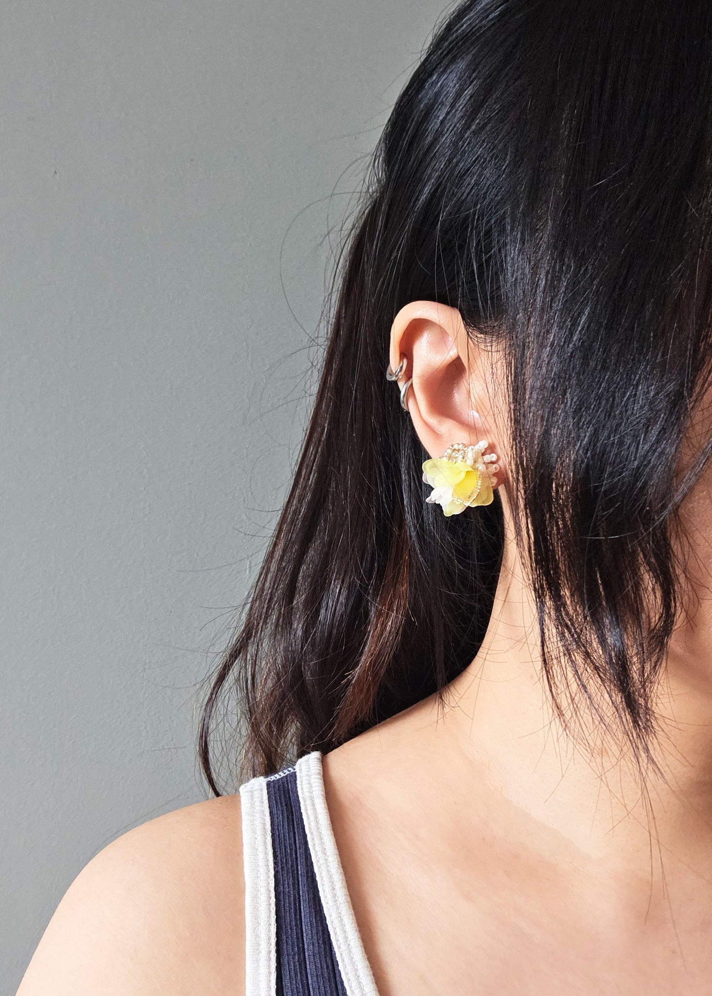 Aurea Bloom Stud Earrings in Yellow Model