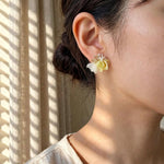 Aurea Bloom Earrings in Yellow on Model