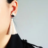 Bada Dos Tassel Earrings