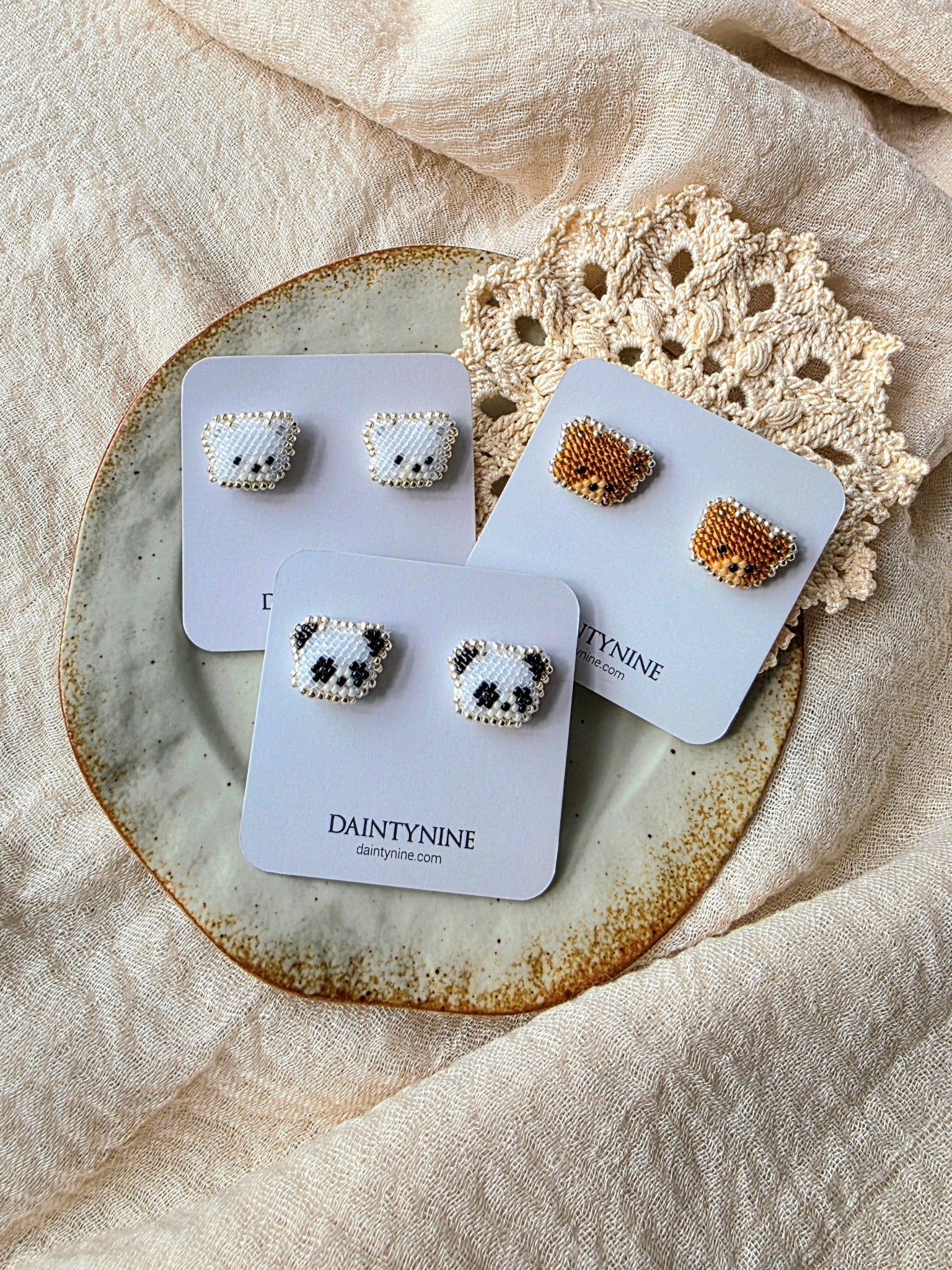Bear stud earrings on cards group