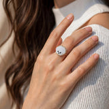 Bichon frise ring on model