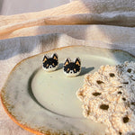 Black shiba inu stud earrings front