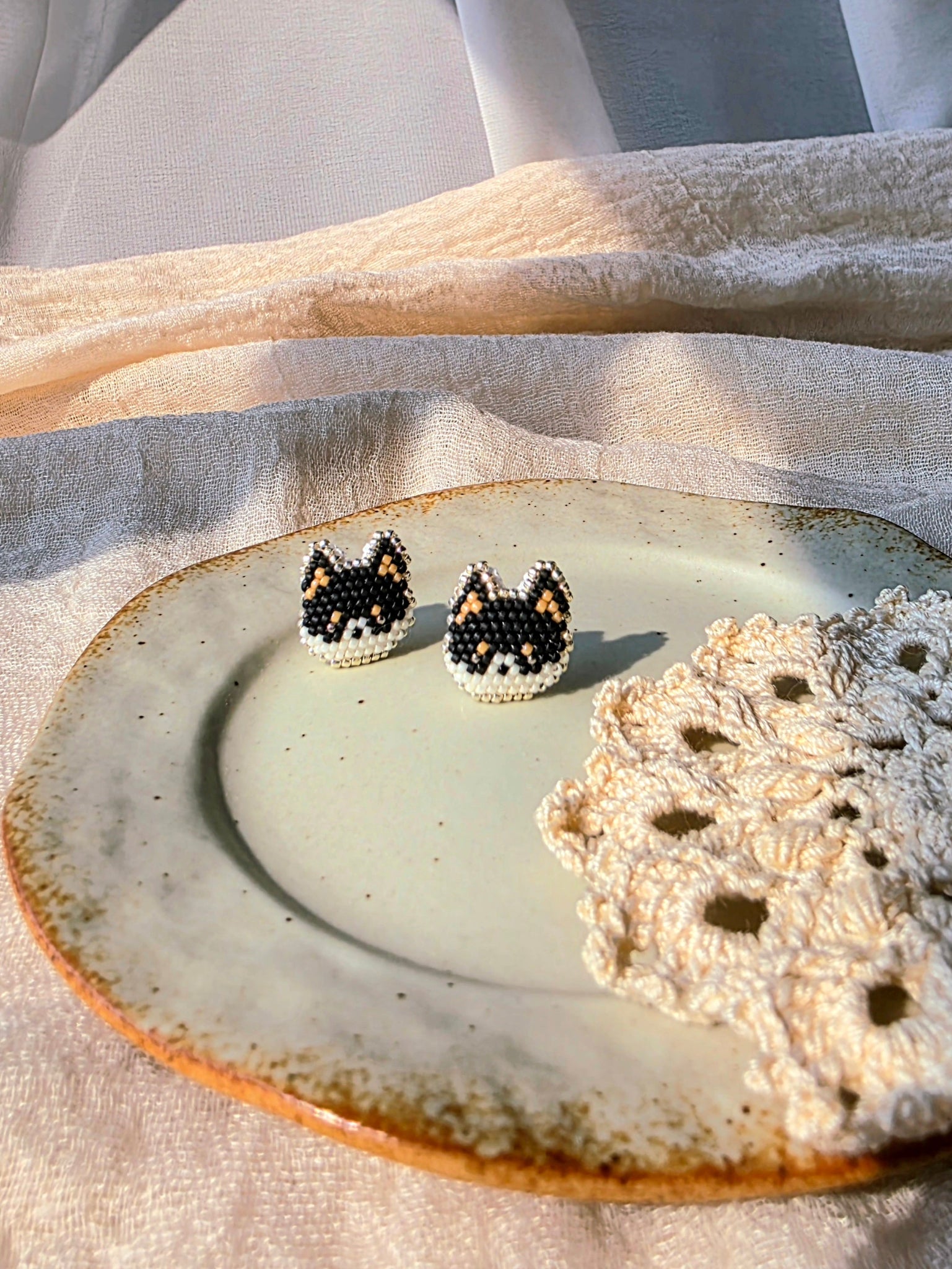 Black shiba inu stud earrings front