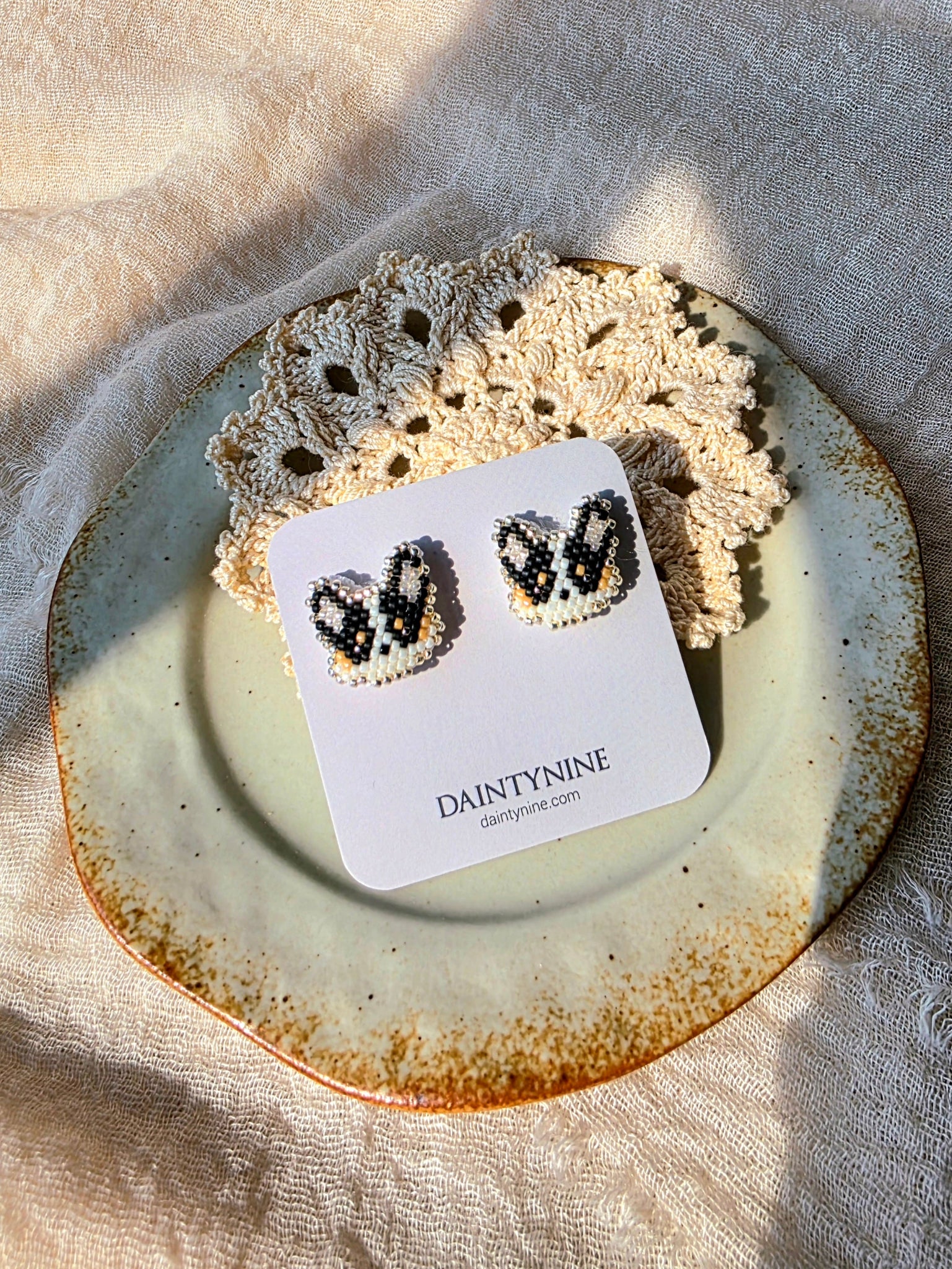 Black welsh corgi stud earrings on card