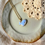 Blue whale necklace left