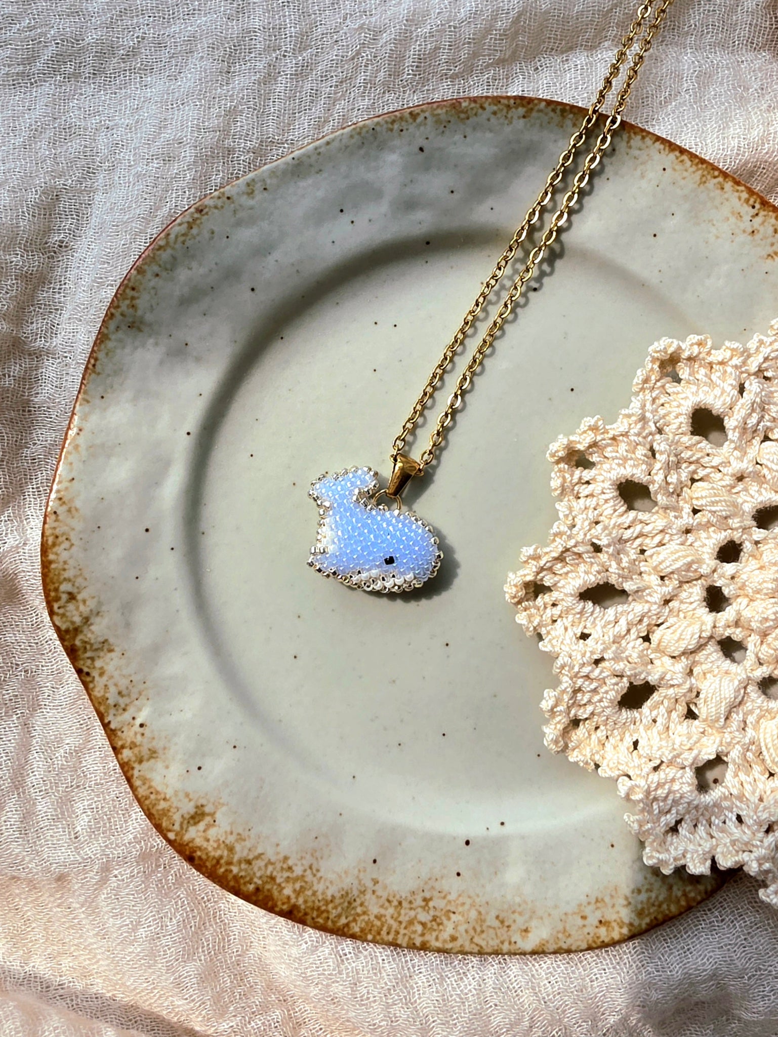 Blue whale necklace right