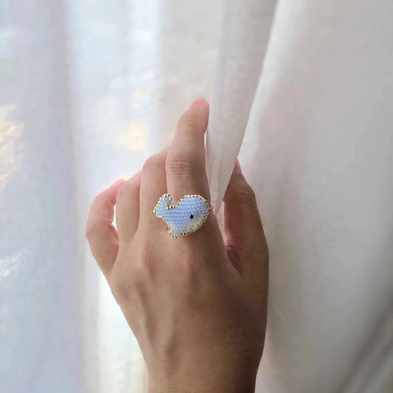 Blue whale ring on model