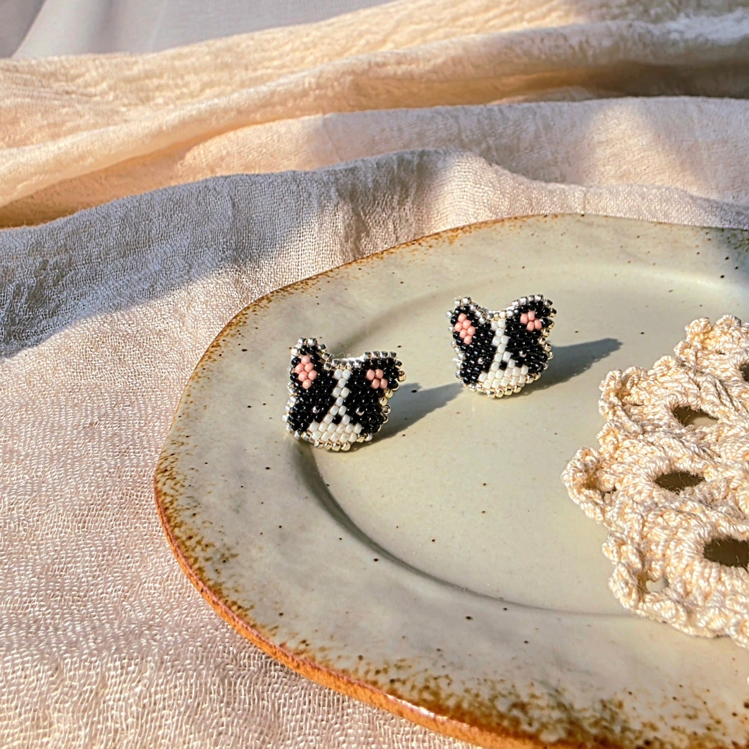 Border collie stud earrings left