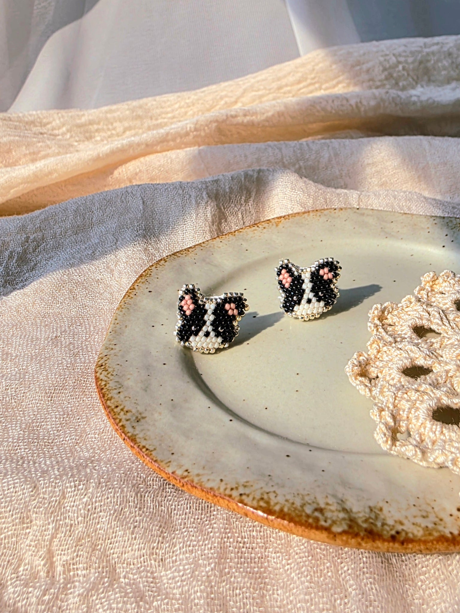 Border collie stud earrings left