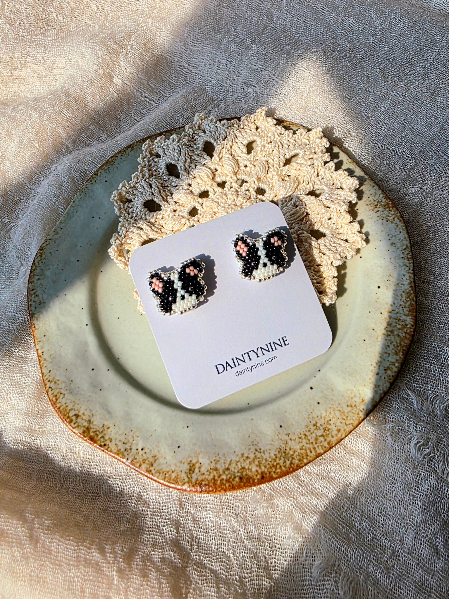 Border collie stud earrings on card