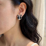 Boston terrier stud earrings on model