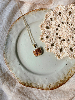 Brown bear necklace left