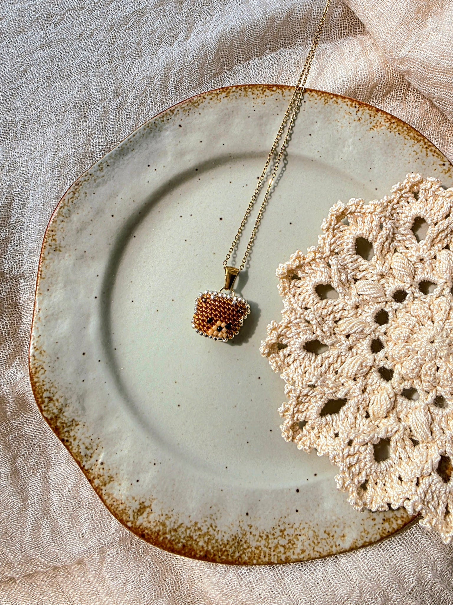 Brown bear necklace right