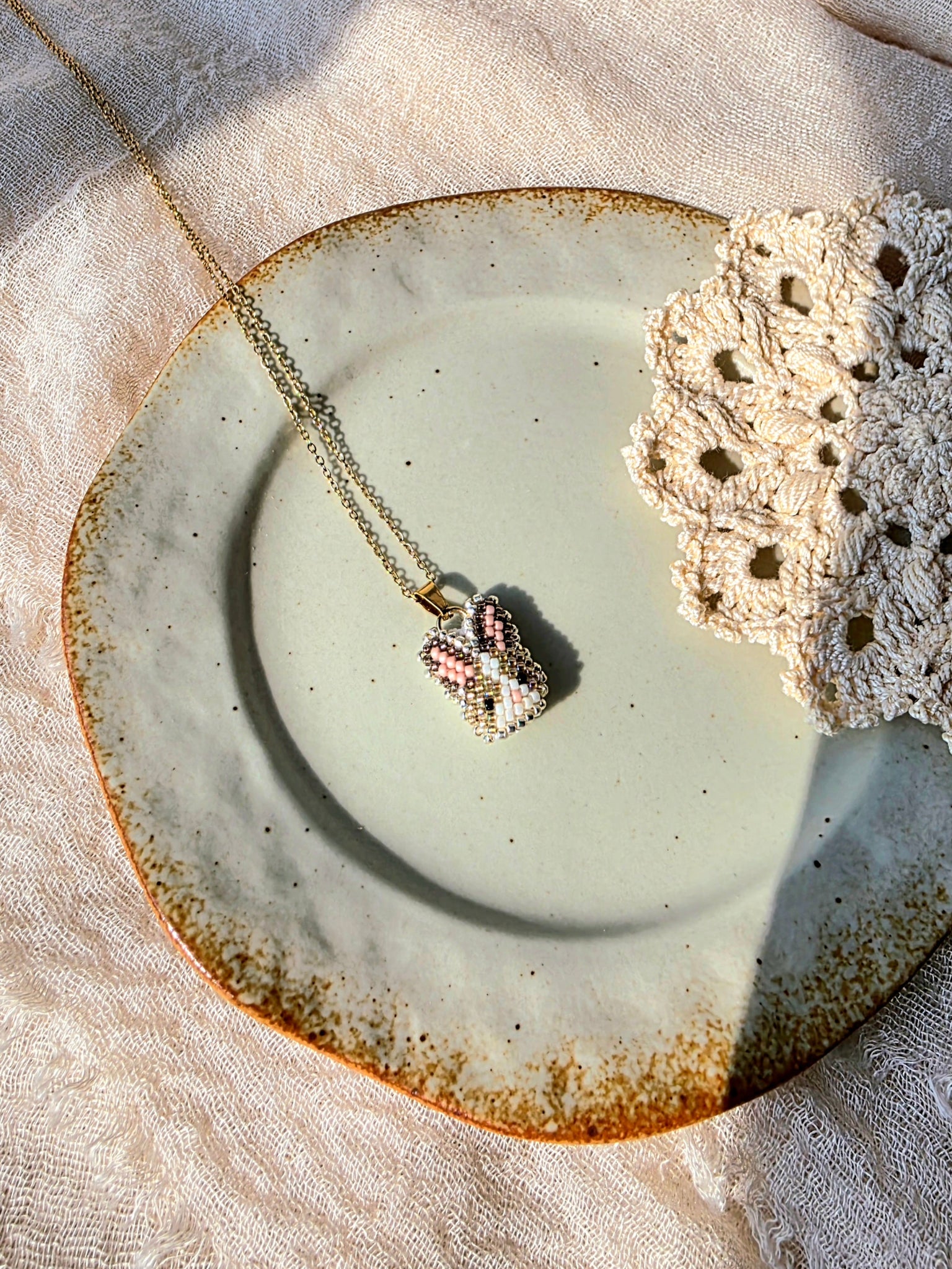 Brown bunny necklace left angle