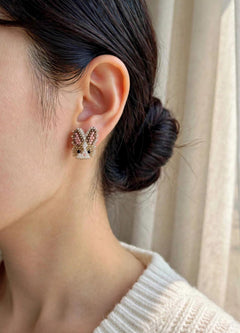 Brown bunny stud earrings on model