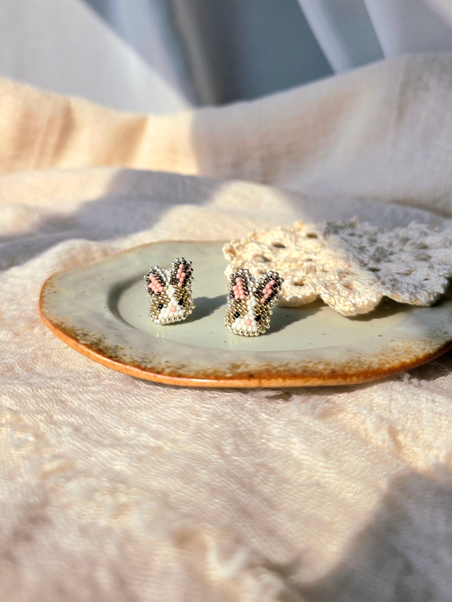 Brown bunny stud earrings right