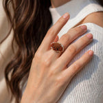 Brown poodle ring on model