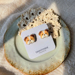 Bulldog stud earrings on card