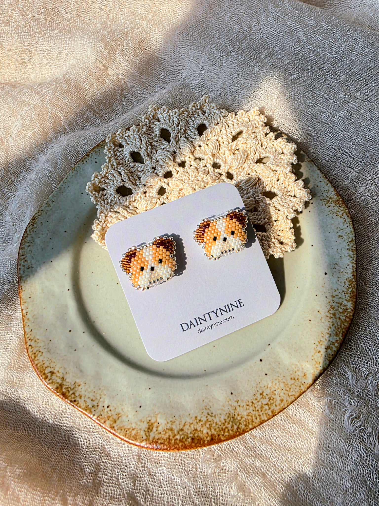 Bulldog stud earrings on card