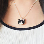 Calico Cat Necklace in Black and White Model Close