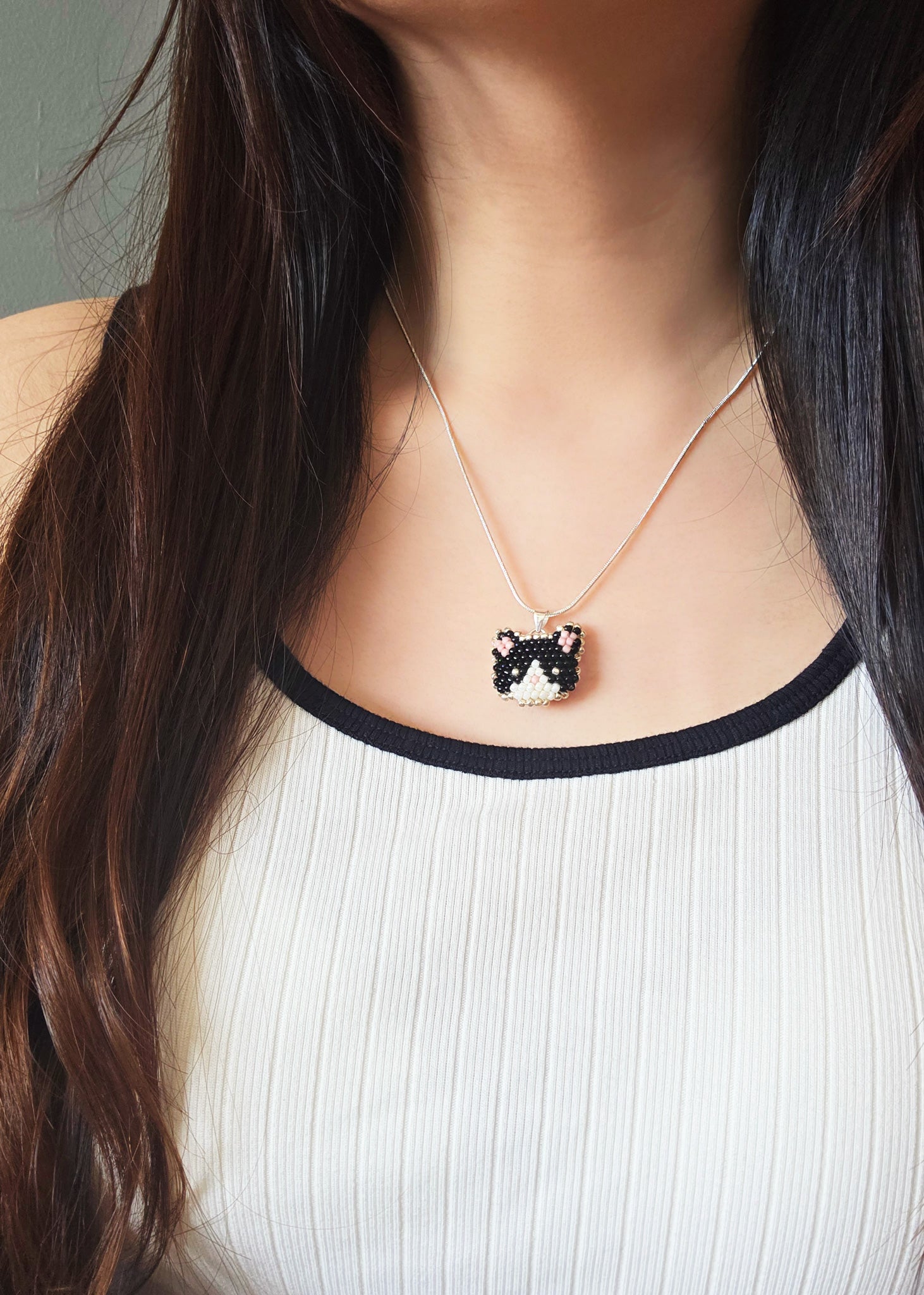 Calico Cat Necklace in Black and White Model