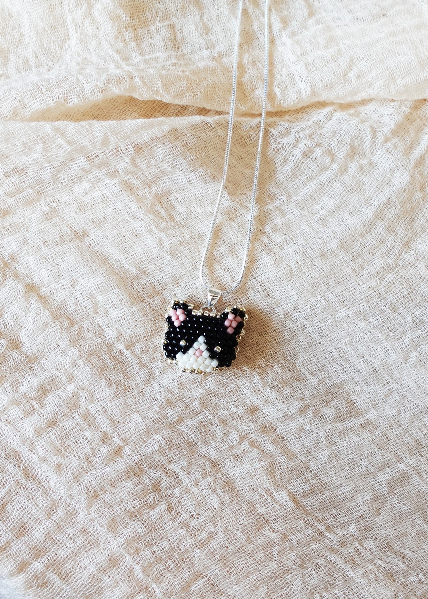Calico Cat Necklace in Black and White Right