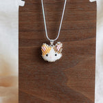 Calico Cat Necklace in Orange and Brown Display Front