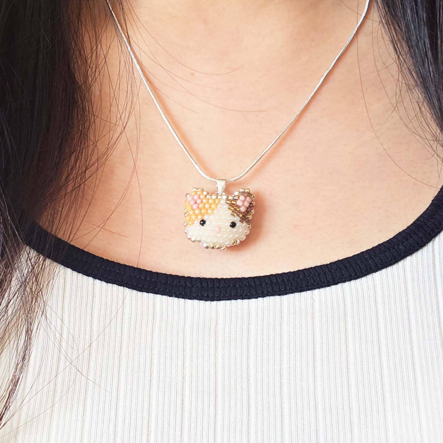 Calico Cat Necklace in Orange and Brown Model Close