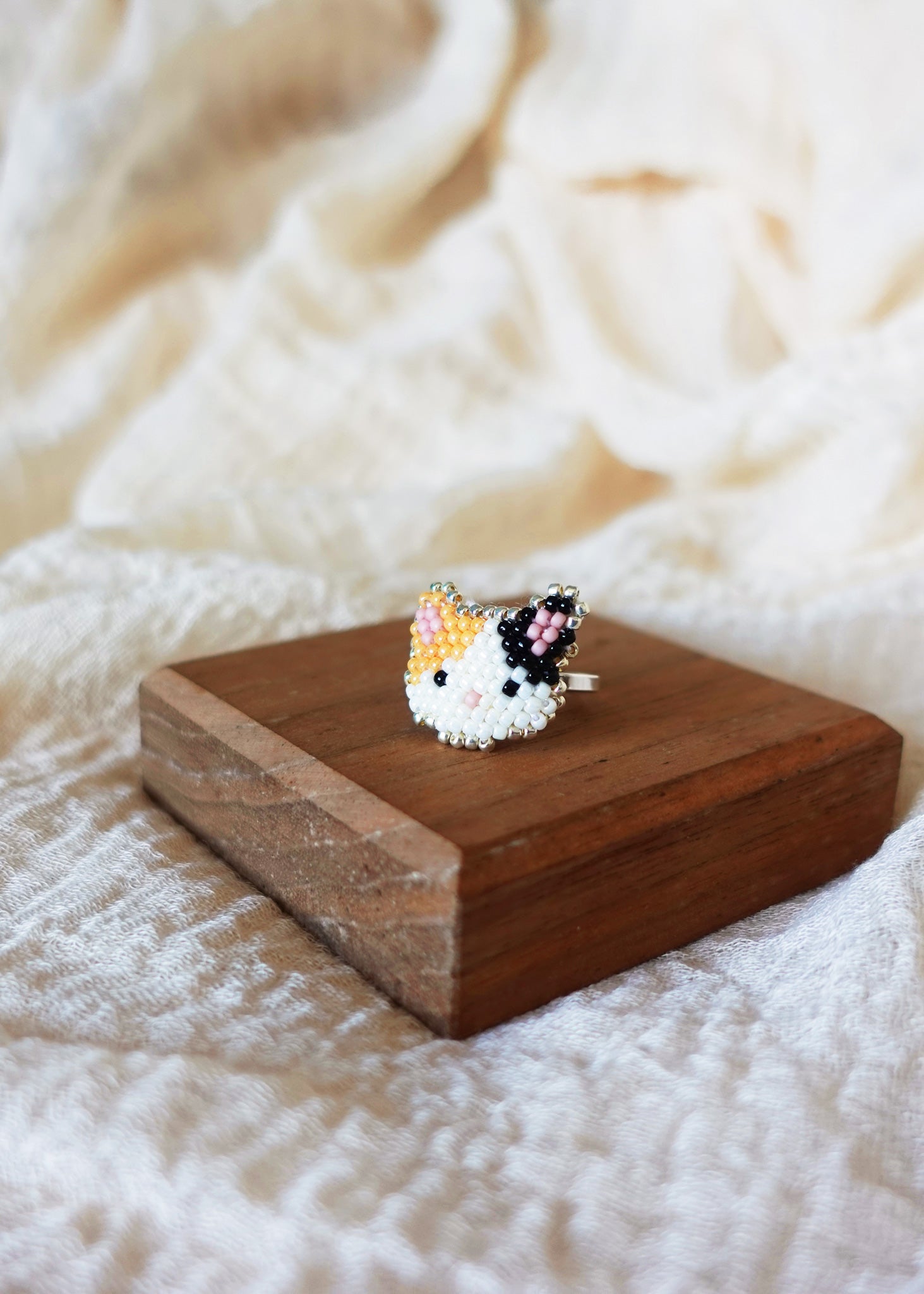 Calico Cat Ring in Orange and Black Display Right